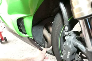 Bending side fairings to free inner fairing