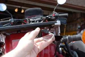 Test fitting helmet lock by hand